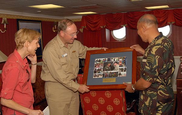 Armed Forces of the Philippines, Chief of Staff, General Alexander B. Yano of the Philippines Army presented with a collection of photos depicting relief efforts by USS Ronald Reagan (CVN 76), and other ships in her group