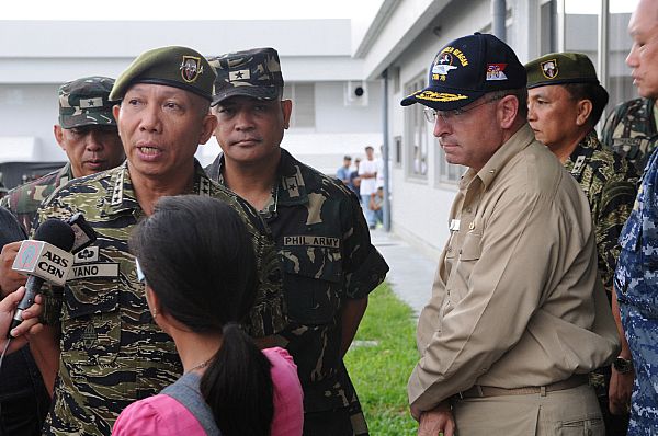 Gen. Alexander B. Yano, chief of staff, Armed Forces of the Philippines (AFP), discusses relief efforts with local media