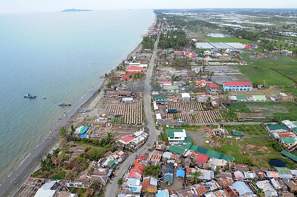 High above Roxas, standing water is visible after the wake of Typhoon Fengshen. The northern part of the island was heaviest hit by the typhoon.