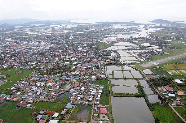 High above Roxas, standing water is visible after the wake of Typhoon Fengshen. The northern part of the island was heaviest hit by the typhoon.