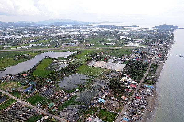 High above Roxas, standing water is visible after the wake of Typhoon Fengshen. The northern part of the island was heaviest hit by the typhoon.