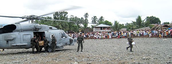 U.S. Navy aircrewmen assigned to the 